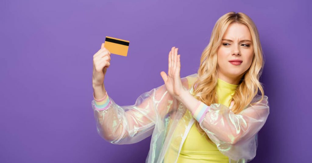 A woman who is about to say "no" to a credit card