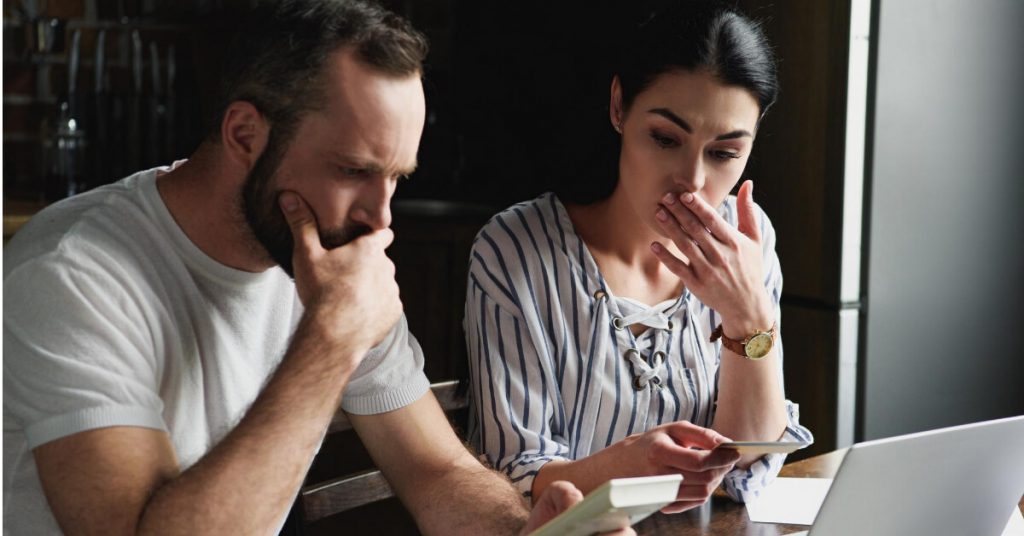 A couple that is shocked when they calculated their expenses